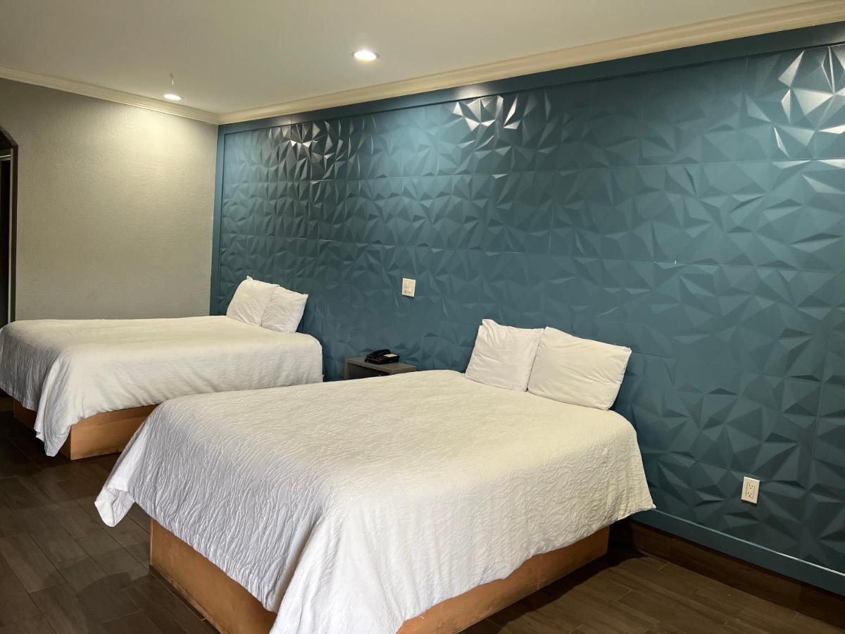 The Symphony Inn & Suites Houston Extérieur photo