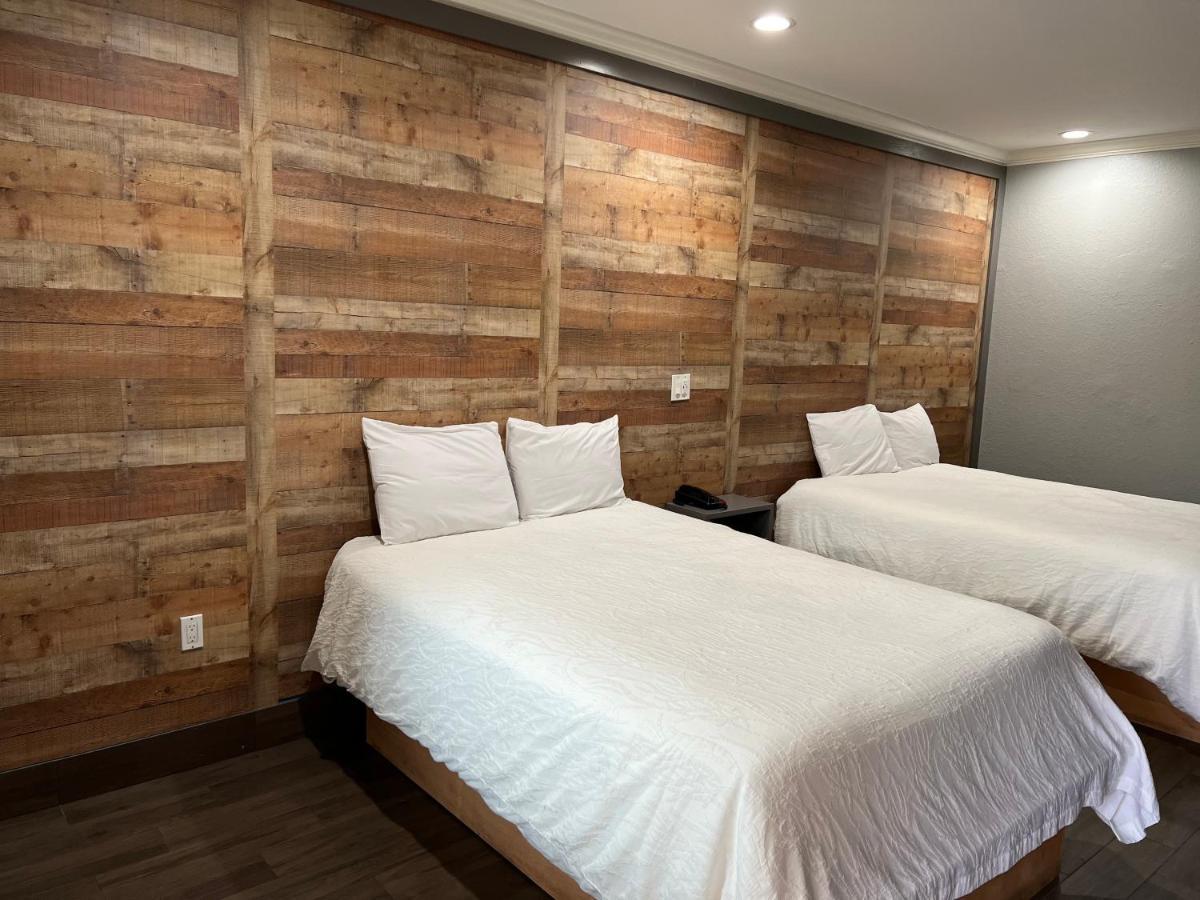 The Symphony Inn & Suites Houston Extérieur photo